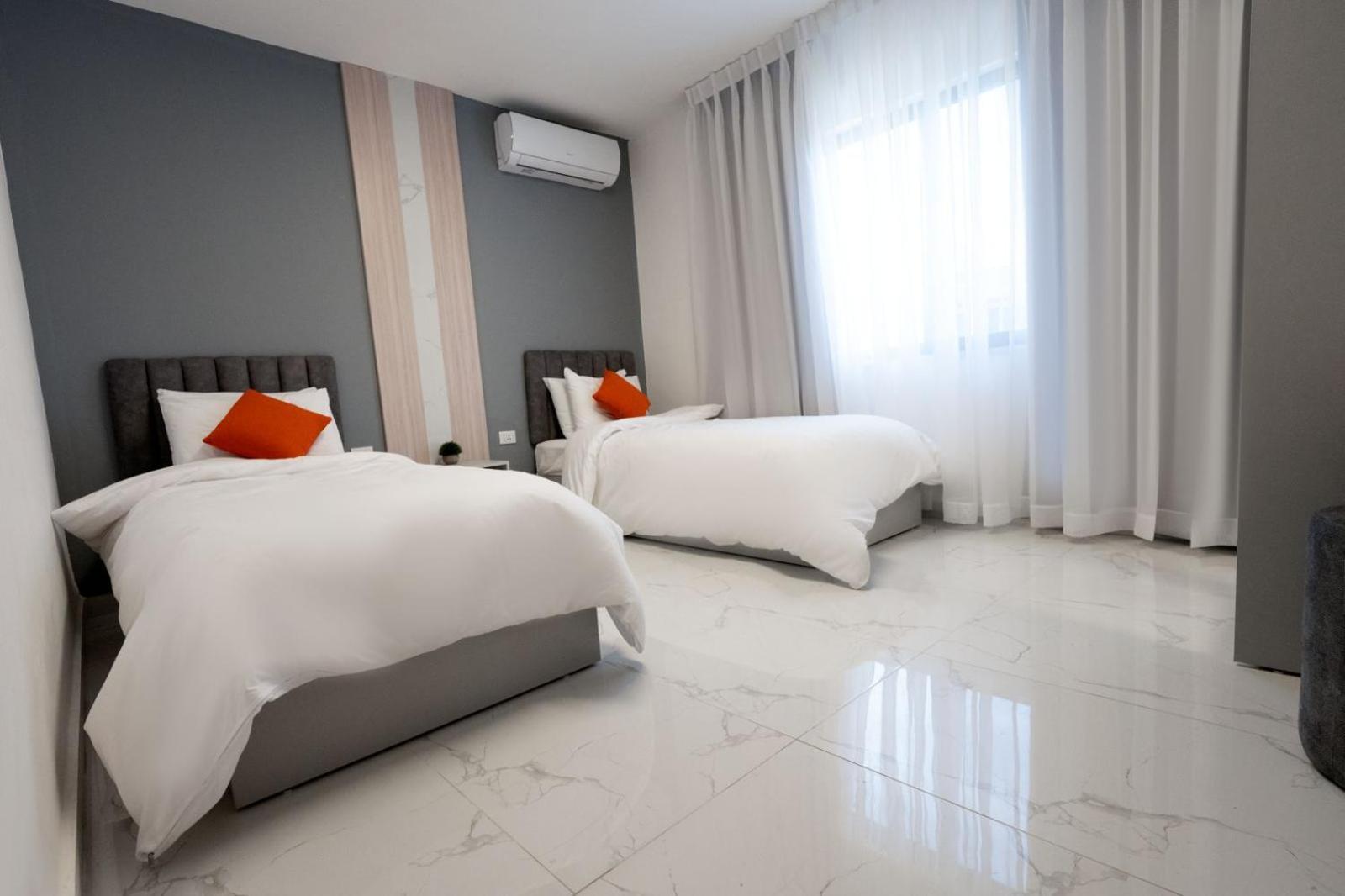 Al Kawther Hotel Apartments Ammán Szoba fotó